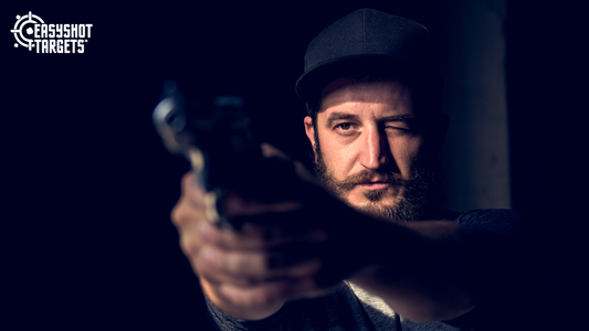 man aiming with a gun