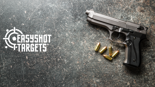 handgun with bullets on concrete floor