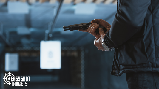 man loading gun at shooting range