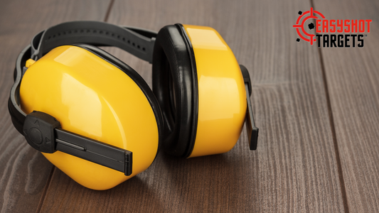 yellow hearing muffs on wooden table
