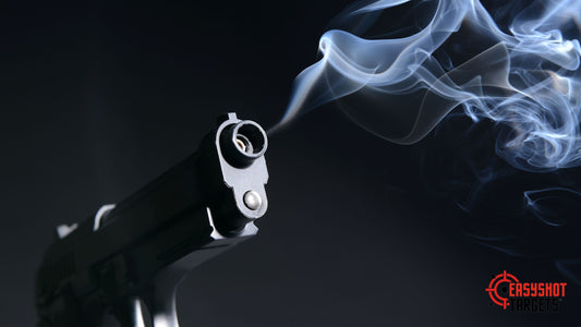 A gun with smoke coming out the front of the gun