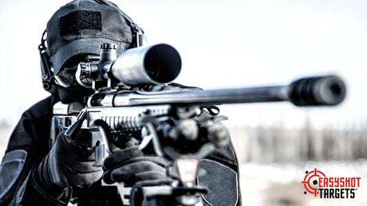 A person kitted out in military gear and aiming through the sight in