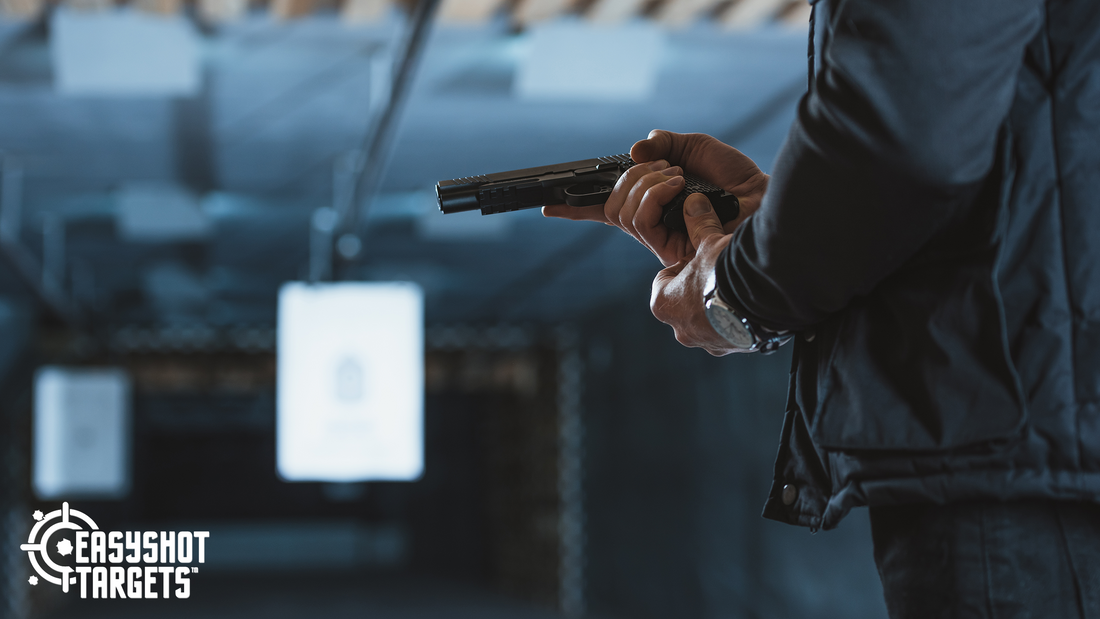 man loading gun at shooting range